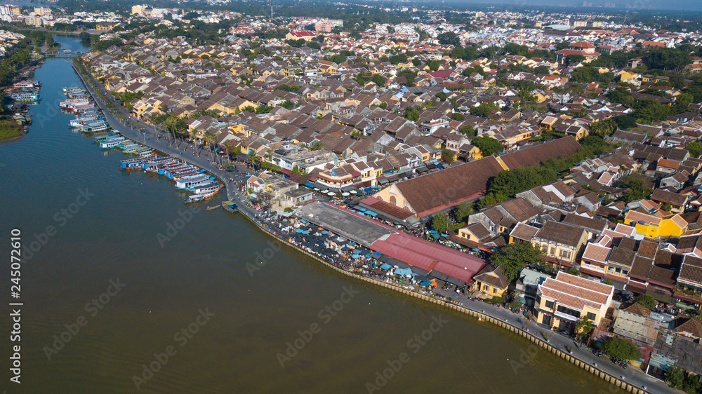 Panorama of Hoian market. Aerial view of Hoi An old town or Hoian ancient town. Royalty high-quality free stock photo image top view of Hoai river and boat traffic in HoiAn market. Hoian city, Vietnam