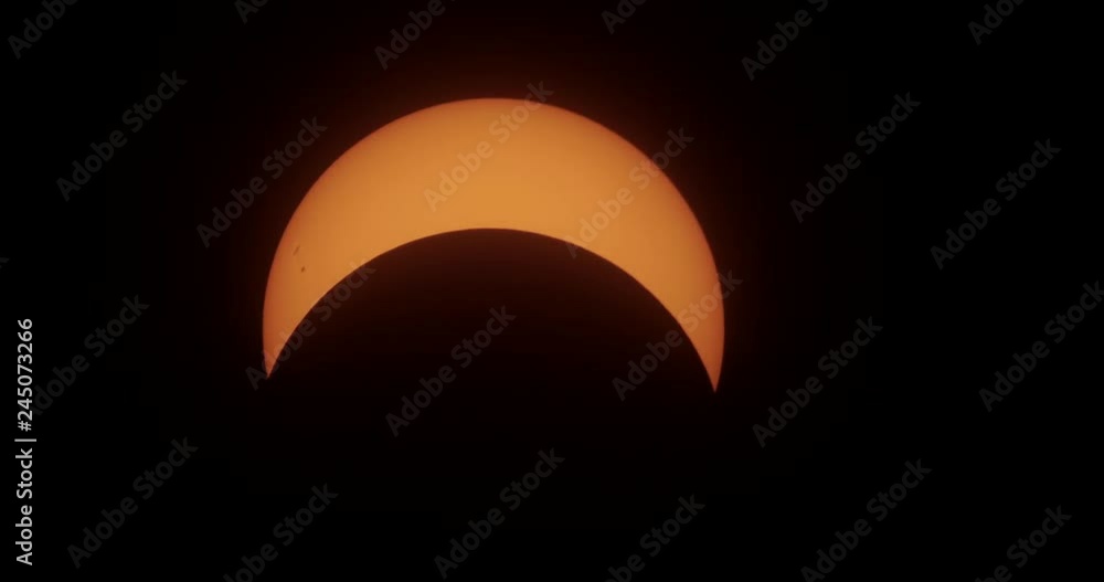 Partial solar eclipse close-up