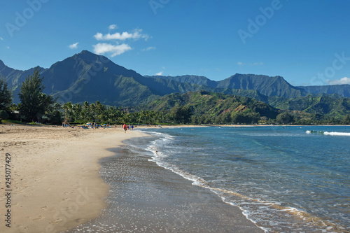 Beachgoers at Hanalei Bay, Kauai photo