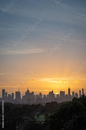 Melbourne city skyline at sunset  Vertical