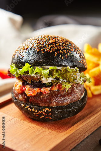 black burger with juicy beef cutlet