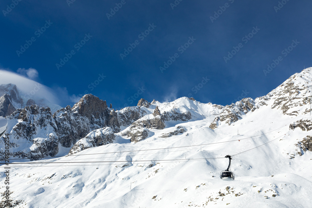 Mont Blanc landscape with snow and cable car panoramic viewpoint -  Courmayeur, Aosta Valley, Italy. The Alps eighth wonder of the world.