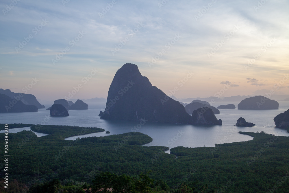 Fabulous view of the mountains, jungles and the sea from a height at dawn. Thailand Phang nga