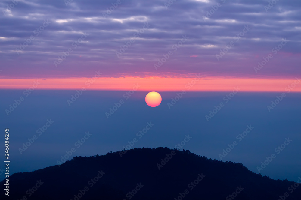 Sunrise and beautiful sky with silhouette of mountain background. Sunrise and beautiful sky with silhouette of mountain background.