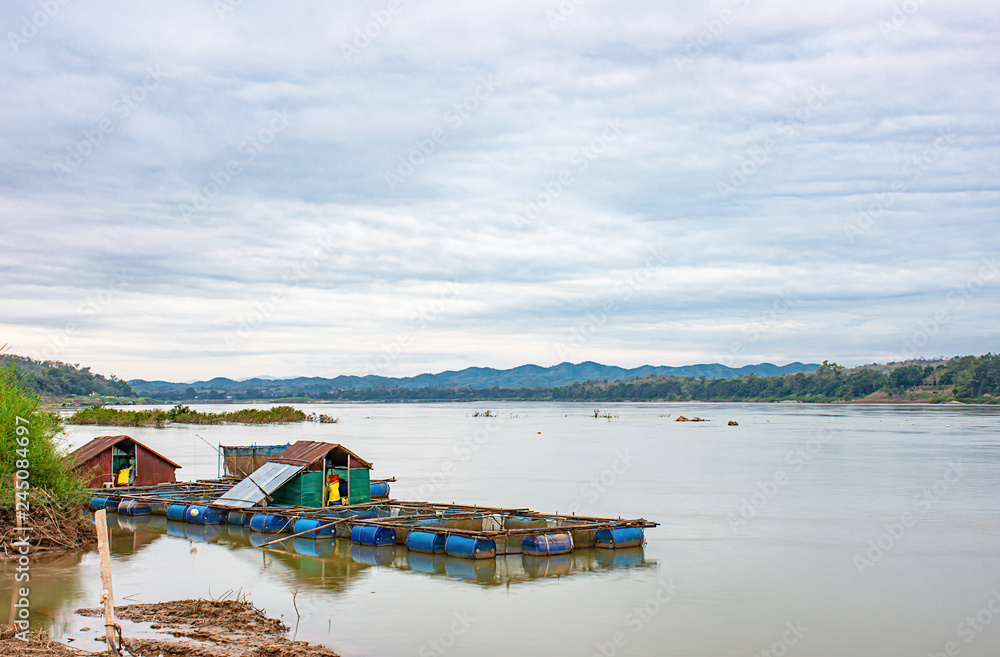 The raft floating fish farming and sky on the Mekong River at Loei in Thailand.