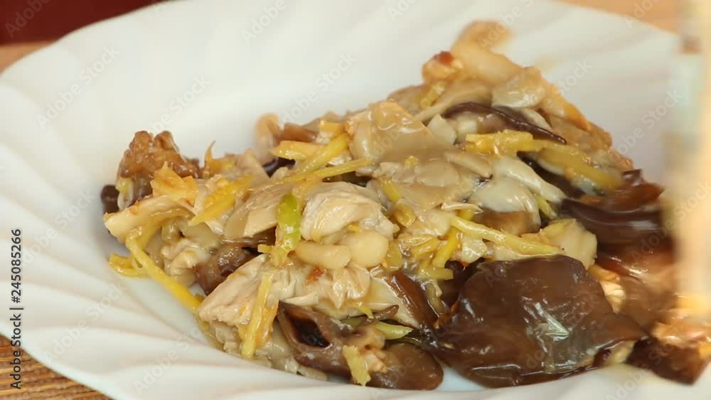 Fried mushrooms and ginger in plate
Fried mushrooms and ginger in plate