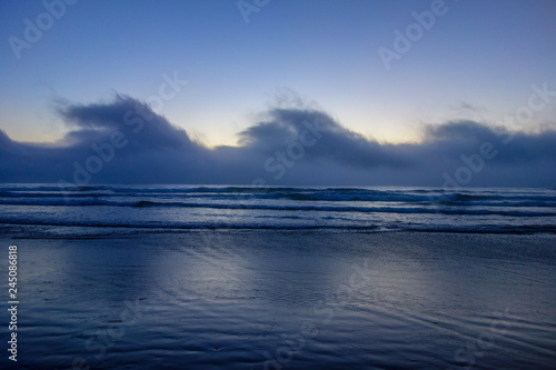 Wallpaper Mural Clouds over the ocean. Clouds in a repetitive shape of a giant wave Torontodigital.ca
