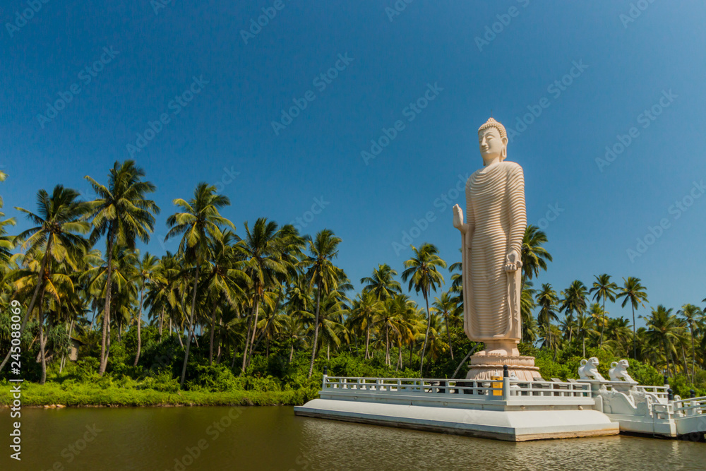Tsunami Memorial. White Buddha in Hikkaduwa, Sri Lanka.