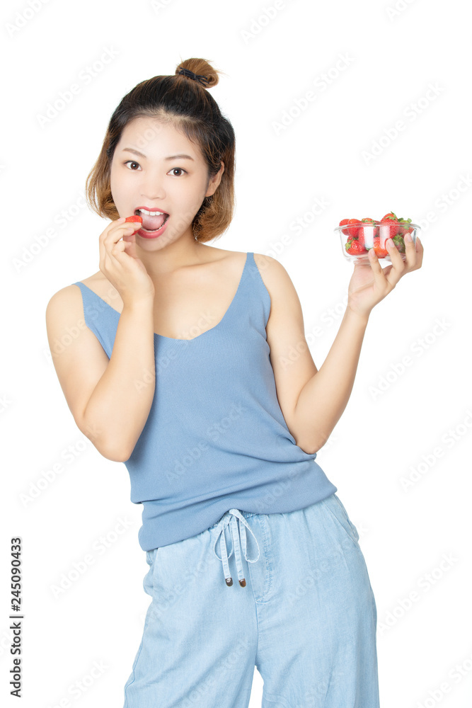 Chinese woman holding bowl of strawberries isolated on white background Chinese woman holding bowl of strawberries isolated on white background