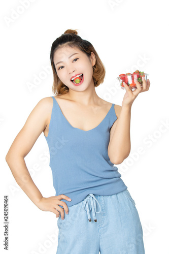 Chinese woman holding bowl of strawberries isolated on white background