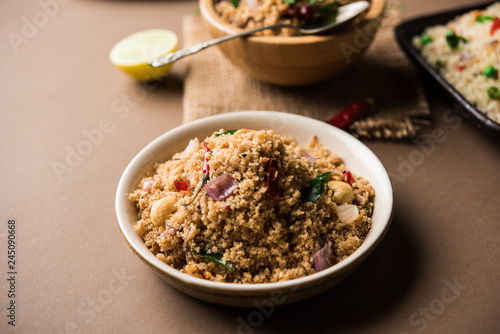 Rava Upma / Uppuma - south indian breakfast served in a bowl. selective focus