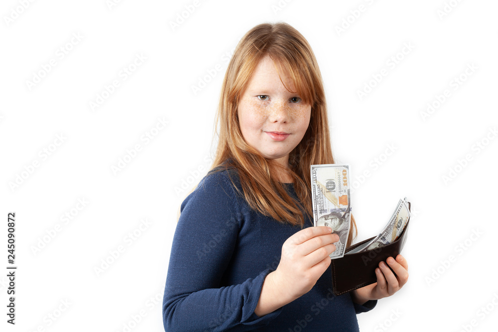 Fat girl holds dollars in her hands and laughs, first earnings of child. Fat girl holds dollars in her hands and laughs, first earnings of child.