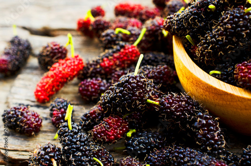 Mulberry fruits with macro close up on wood backgrounds