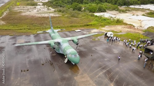 Aerial Drone Panning Shot of a Brazilian Air Base Preparing for a Surgical Expedition in South America. photo