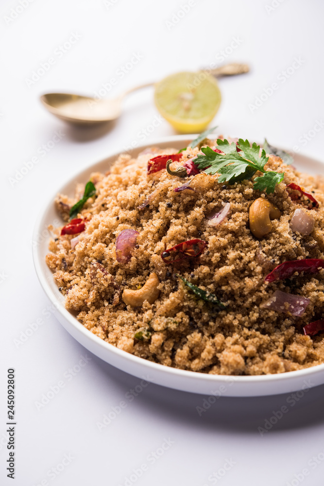 Rava Upma / Uppuma - south indian breakfast served in a bowl. selective focus Rava Upma / Uppuma - south indian breakfast served in a bowl. selective focus