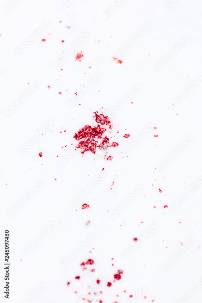 Obraz premium Red blood on white snow as a background