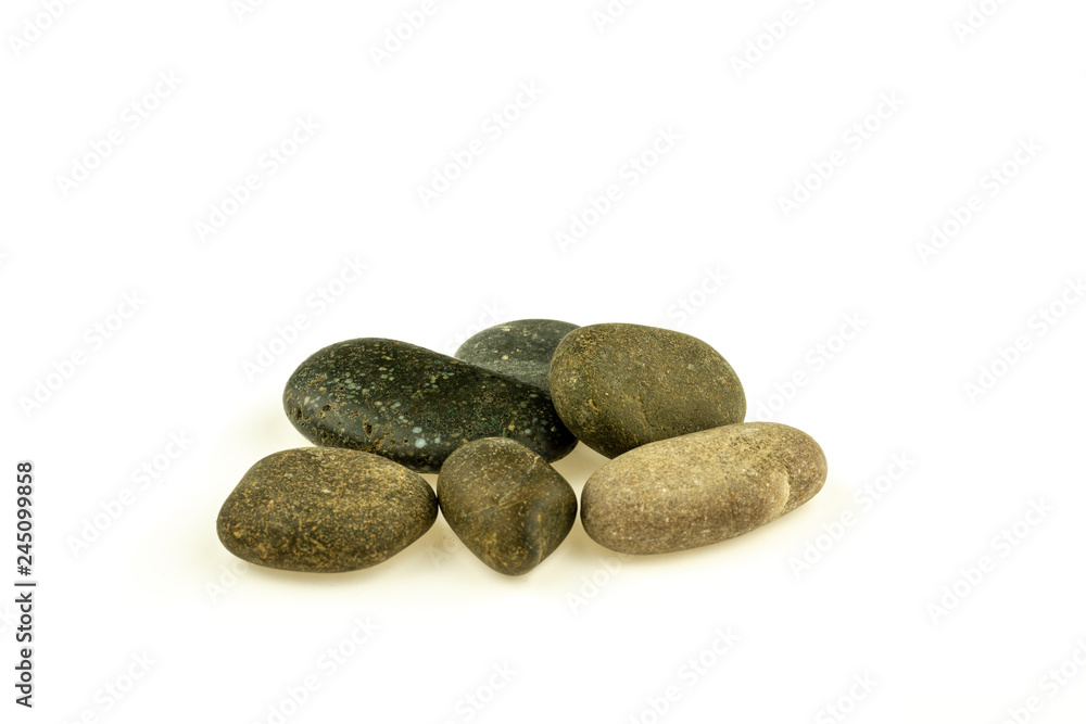 pile of a different stones and pebbles isolated on white background. pile of a different stones and pebbles isolated on white background.