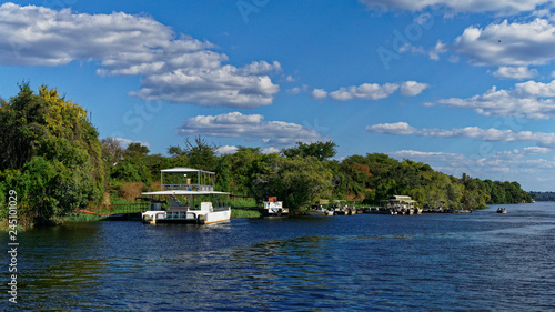 Tourist river cruise boats, Zambezi river, Chobe National Park, Botswana.