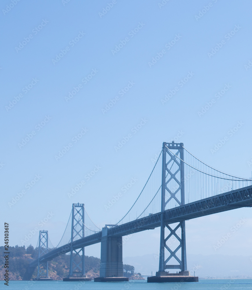 Bridge above water near coast in sunny day Bridge above water near coast in sunny day