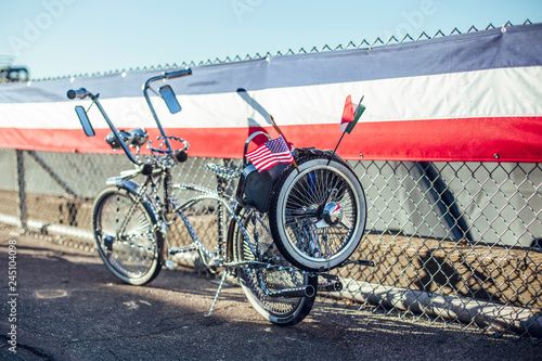 Decorated retro cycle on street photo