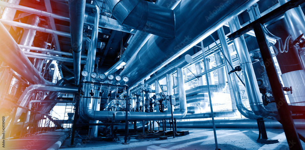 Industrial zone, Steel pipelines and cables in blue tones Industrial zone, Steel pipelines and cables in blue tones
