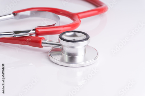 Stethoscope On White Background with selective focus and crop fragment