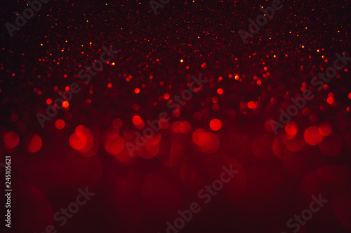 Hot and dark defocused red lights for Valentine's day background. Red bokeh and red background.