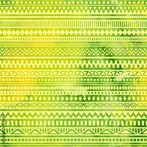 Watercolor seamless geometric pattern. Green paint texture on paper. Ethnic and tribal motifs. Handwork. Vector illustration.