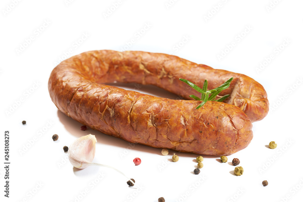 Sausage with herbs and spices on a white background Sausage with herbs and spices on a white background