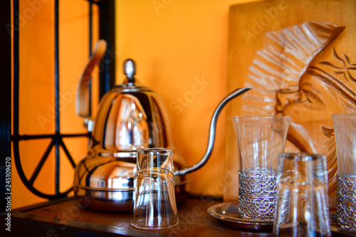 Cup and jug made of copper for water, tea, coffee or wine. © Wichaiwish