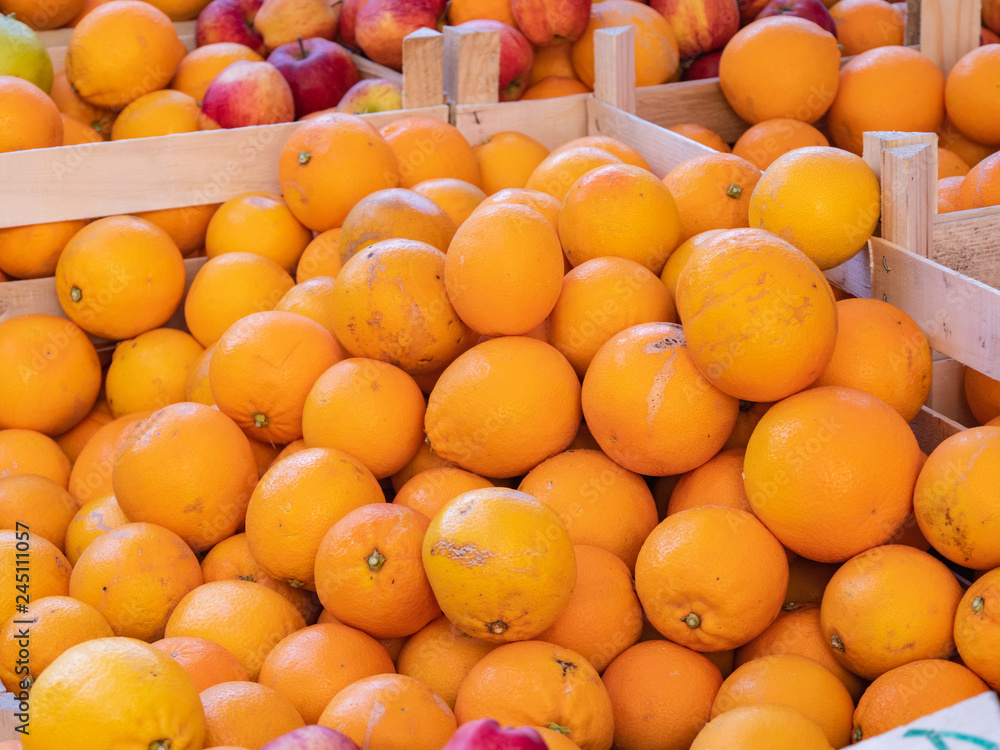 Oranges are one of the simple pleasures of eating in Italy. A lot of oranges were sold at the market of Genoa, Italy.