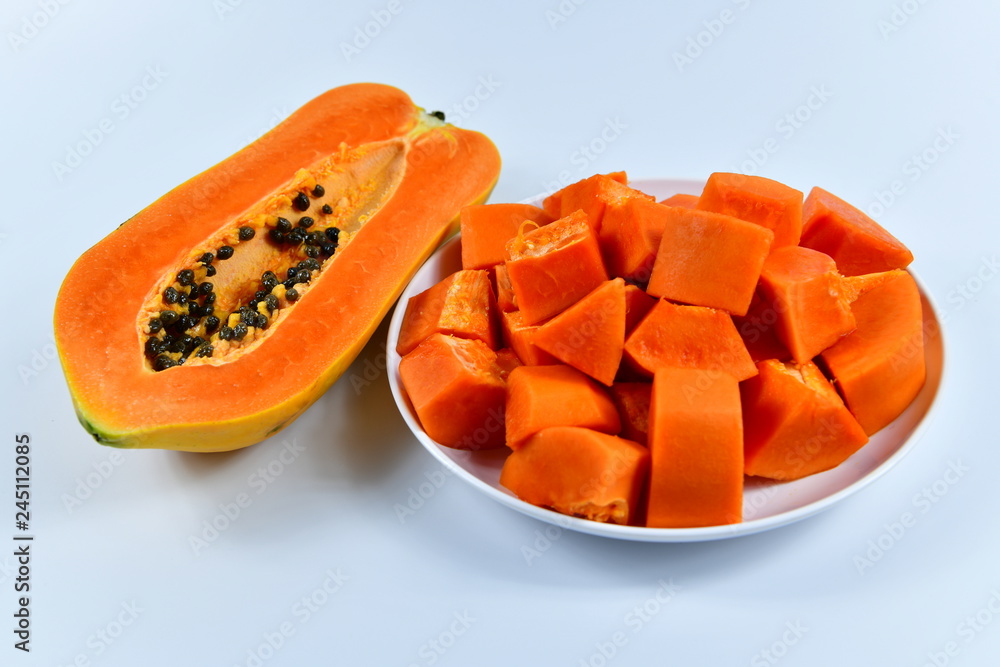 Slices of papaya on white background. Slices of papaya on white background.