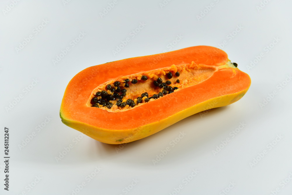 Slices of papaya on white background. Slices of papaya on white background.