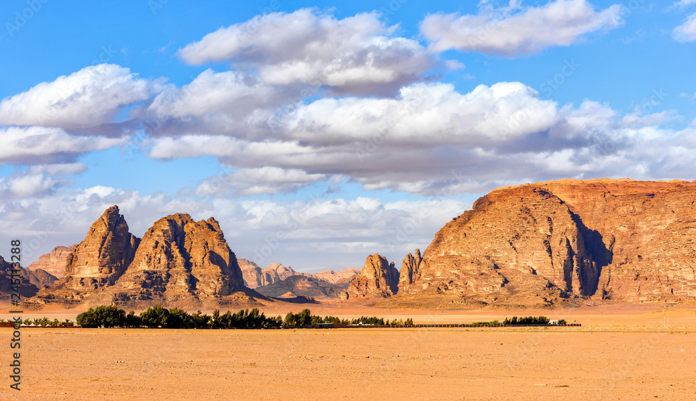 Beautiful landscape consisting of rocky mountains in the middle of the Wadi Rum desert in Jordan.
