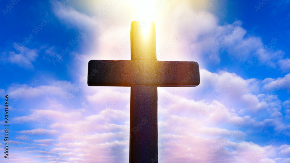 Glowing cross in sky . Happy Easter. Light from sky . Religion background .  Paradise heaven . Light in sky .