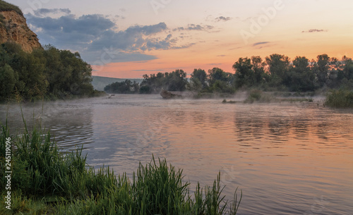 Dawn on river.