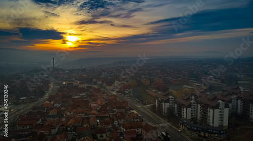 Aerial view of sunset in Kragujevac town in Serbia, cloudy winter day