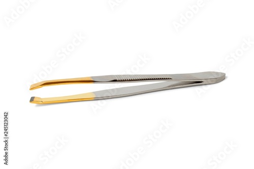 Fototapet Cosmetic tweezers on white