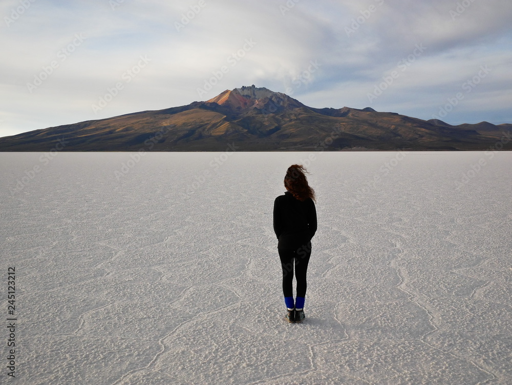 Young tourist at Salar de Uyuni, Bolivia