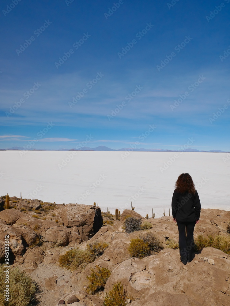 Young tourist at Salar de Uyuni, Bolivia