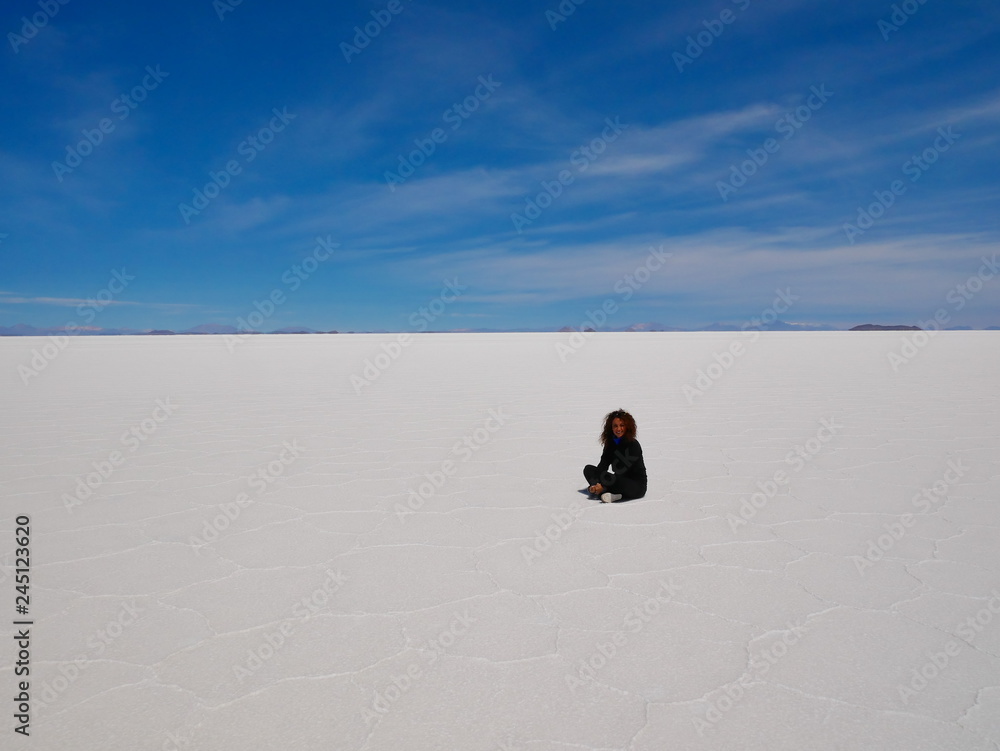Young tourist at Salar de Uyuni, Bolivia