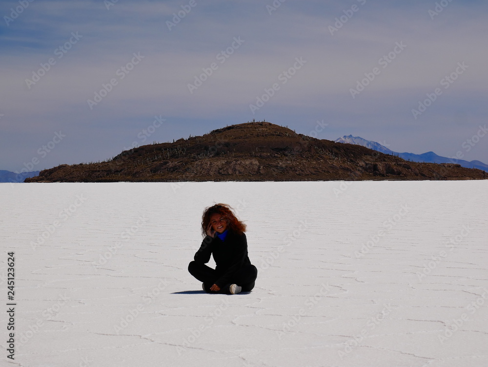 Young tourist at Salar de Uyuni, Bolivia