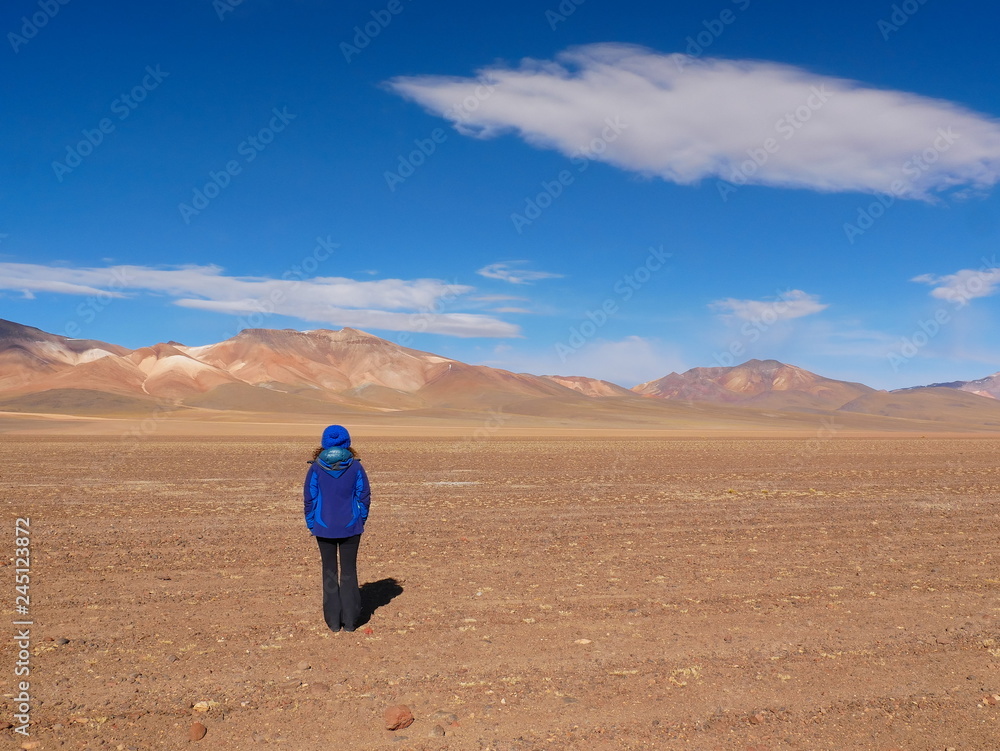 Tourist in the high altitude desert, Bolivia