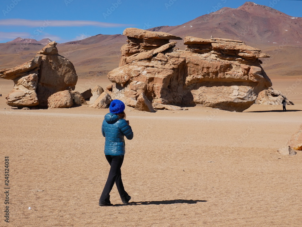 Tourist in the high altitude desert, Bolivia