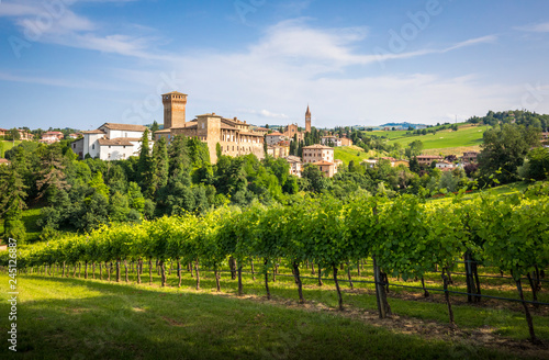 Levizzano Rangone with some wineyards on the foreground during springtiime. Castelvetro Rangone  Modena  Emilia Romagna  Italy