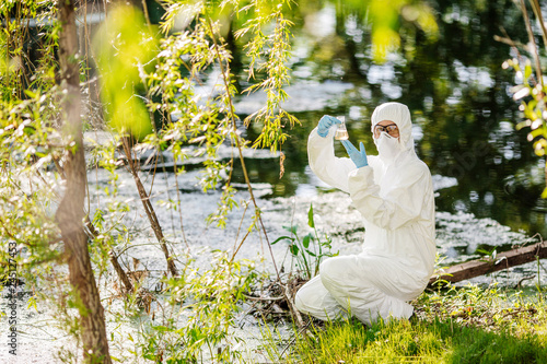 biologist working on water analysis. Ecology and environmental pollution concept.