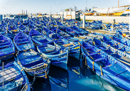 Essaouira, Morocco. Blue fishing boats in the ancient and old fishing port