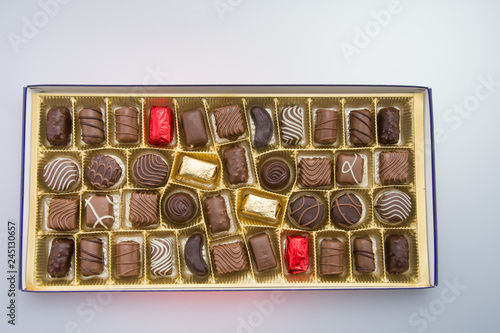 Box of gourmet bonbons, aka bon-bons and truffles, pralines box © Laurenx