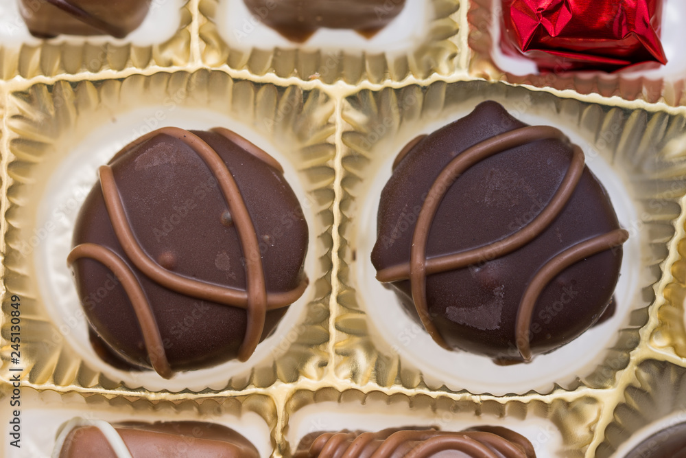 Obraz premium Box of gourmet bonbons, aka bon-bons and truffles, pralines box