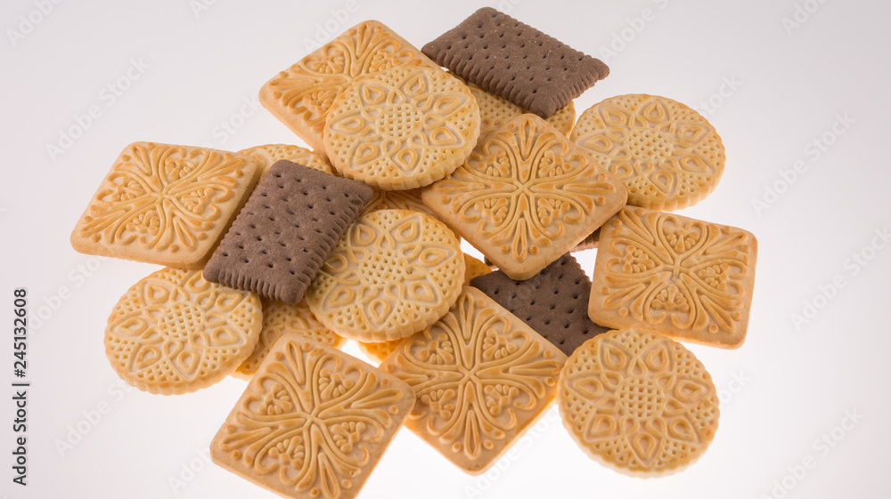 Brown, square ,round, biscuits cracker isolated on white background Brown, square ,round, biscuits cracker isolated on white background